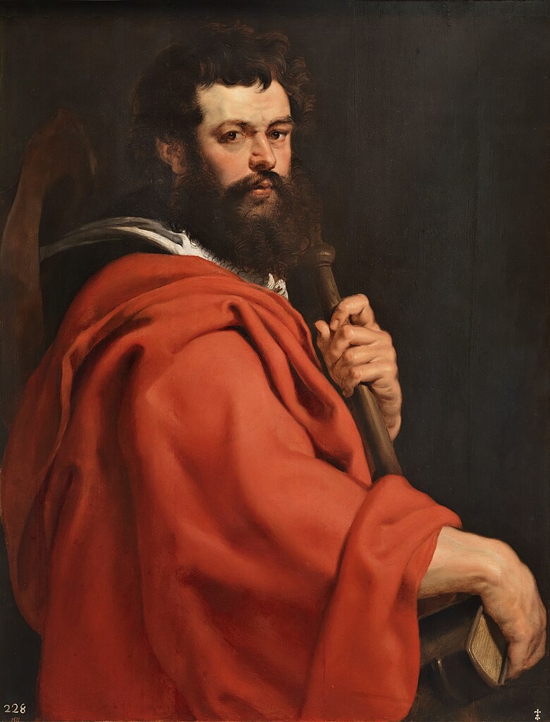 A painting of the apostle Saint James the Elder by Peter Paul Rubens. Robed in red, he stands facing the view, holding a bible in his right hand and a staff in his left hand.