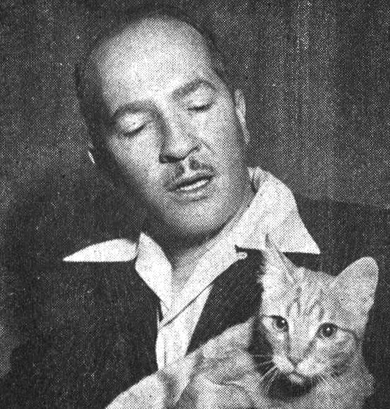 A photo of Robert A. Heinlein holding a cat